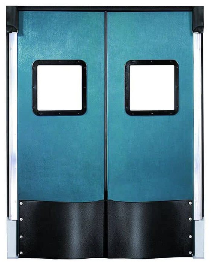 An industrial impact traffic door with a reinforced panel and large vision window, of the type supplied by Canuck Door Systems