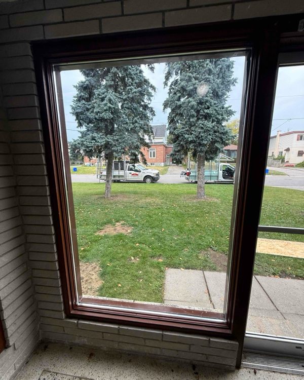 A replacement aluminum window unit set into a clad wall on a commercial building, installed by Canuck Door Systems