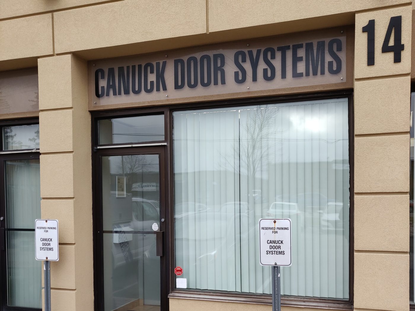 The Canuck Door Systems shop and office entrance at unit 14, 1645 Bonhill Road, Mississauga