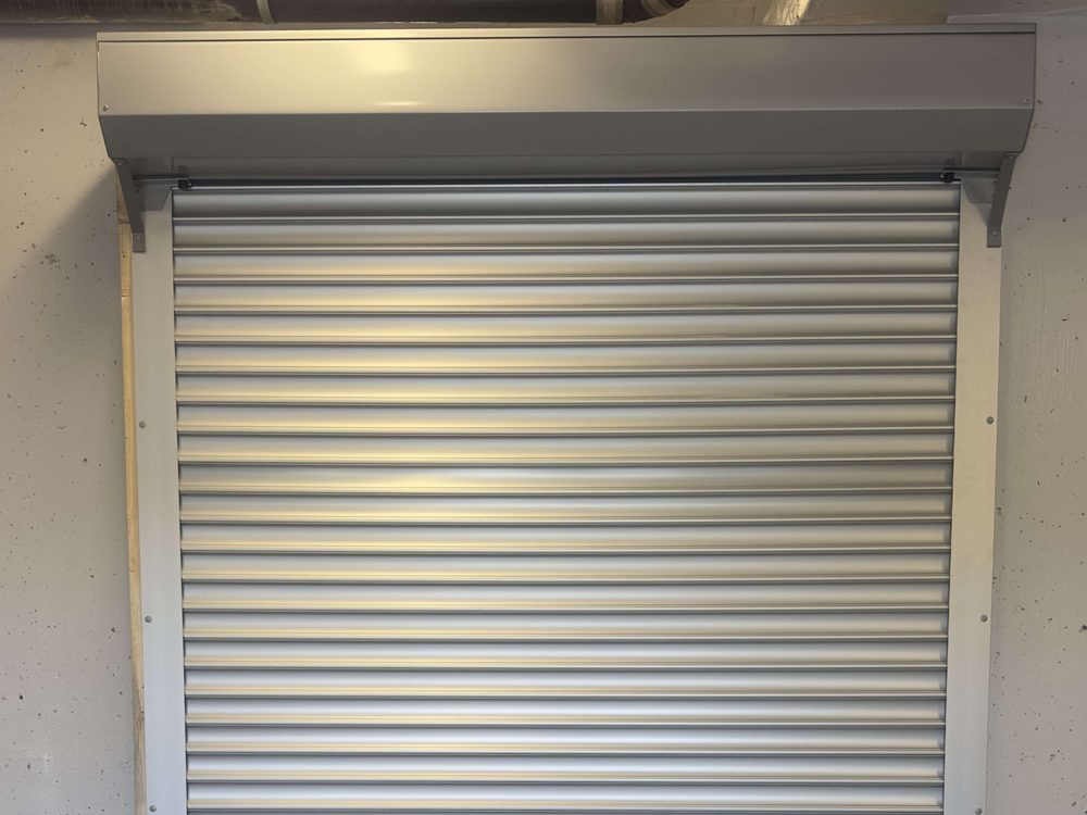 Security Shutters & Grilles installed by Canuck Door Systems for Kings Restoration Group in Brampton