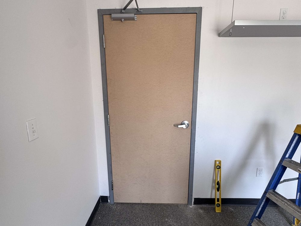 Wood Doors installed by Canuck Door Systems for Tri-Phase Group in Brampton