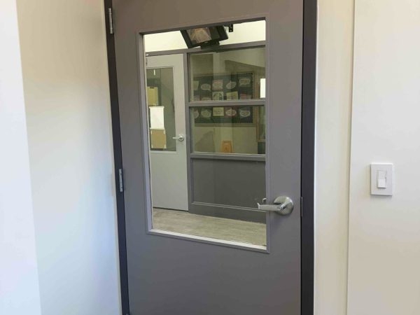 Wood Doors installed by Canuck Door Systems for ONIT Construction in Burlington