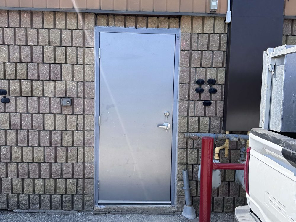 Hollow Metal & Steel Doors installed by Canuck Door Systems for Flamboro Center Properties Ltd in Hamilton
