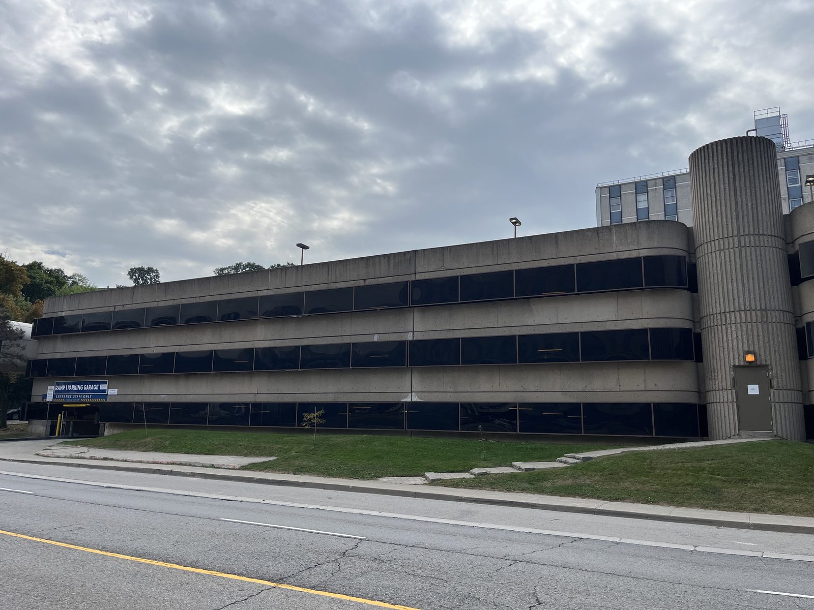 The multi-level concrete parking garage at St. Joseph's Healthcare Hamilton, seen from the street, where Canuck Door Systems replaced 89 stairwell doors