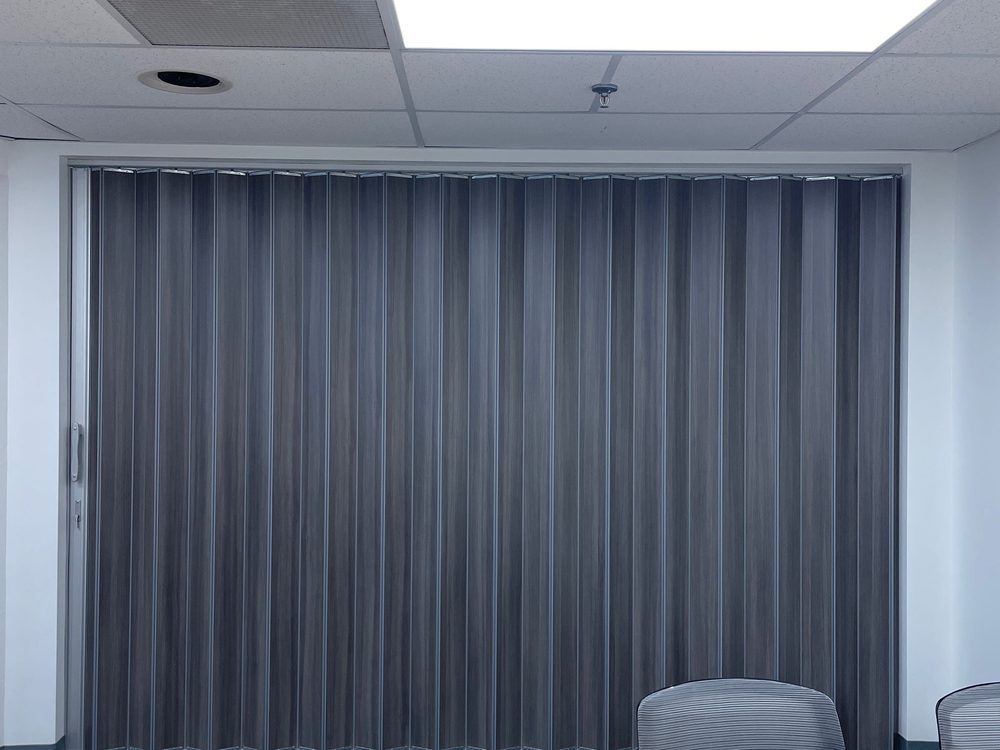 Folding Partitions installed by Canuck Door Systems for M.J.R.K Construction in Hamilton