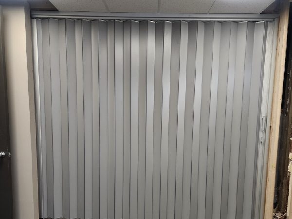 Folding Partitions installed by Canuck Door Systems for MW Coating Systems Ltd in Hamilton