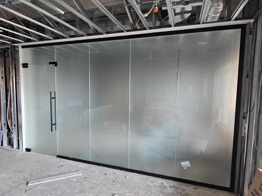 Frameless Glass Doors & Walls installed by Canuck Door Systems for Roxborough Park Inc. / RPI Apartments Inc in Hamilton
