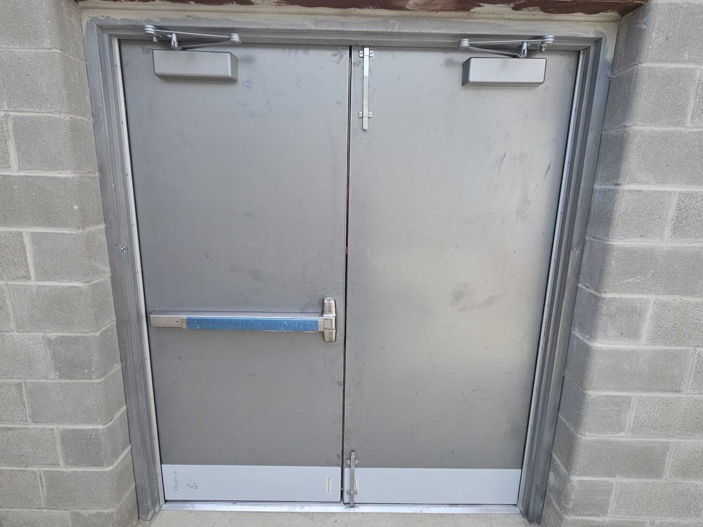 Hollow Metal & Steel Doors installed by Canuck Door Systems for Kingdom Construction Limited in Innisfil