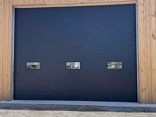 Overhead Doors installed by Canuck Door Systems for Edgar Howden and Sons Ltd in Milton