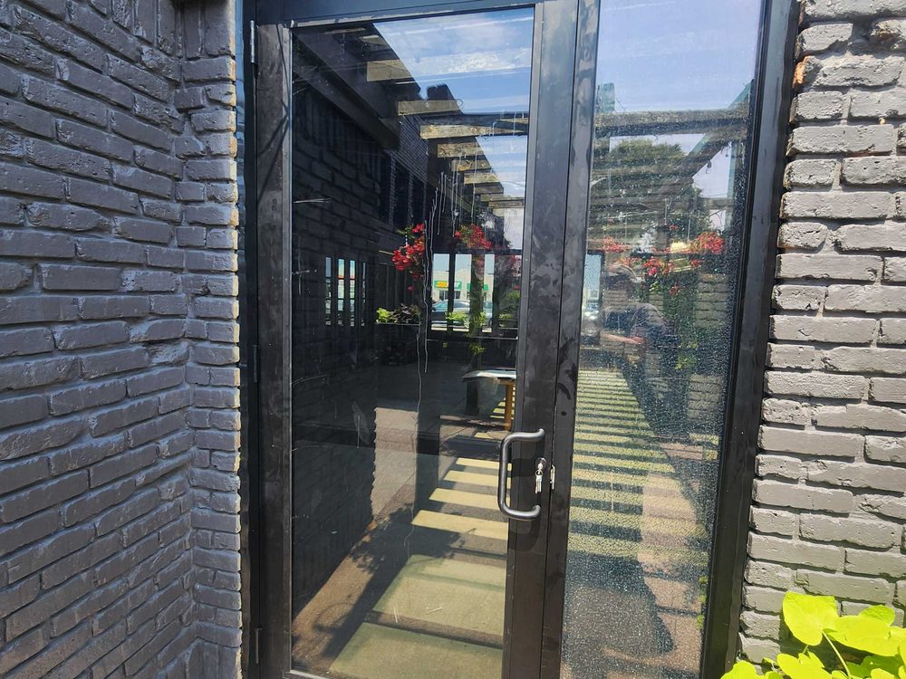 Commercial Glass & Aluminum Doors installed by Canuck Door Systems for Tandoori Flame in Mississauga
