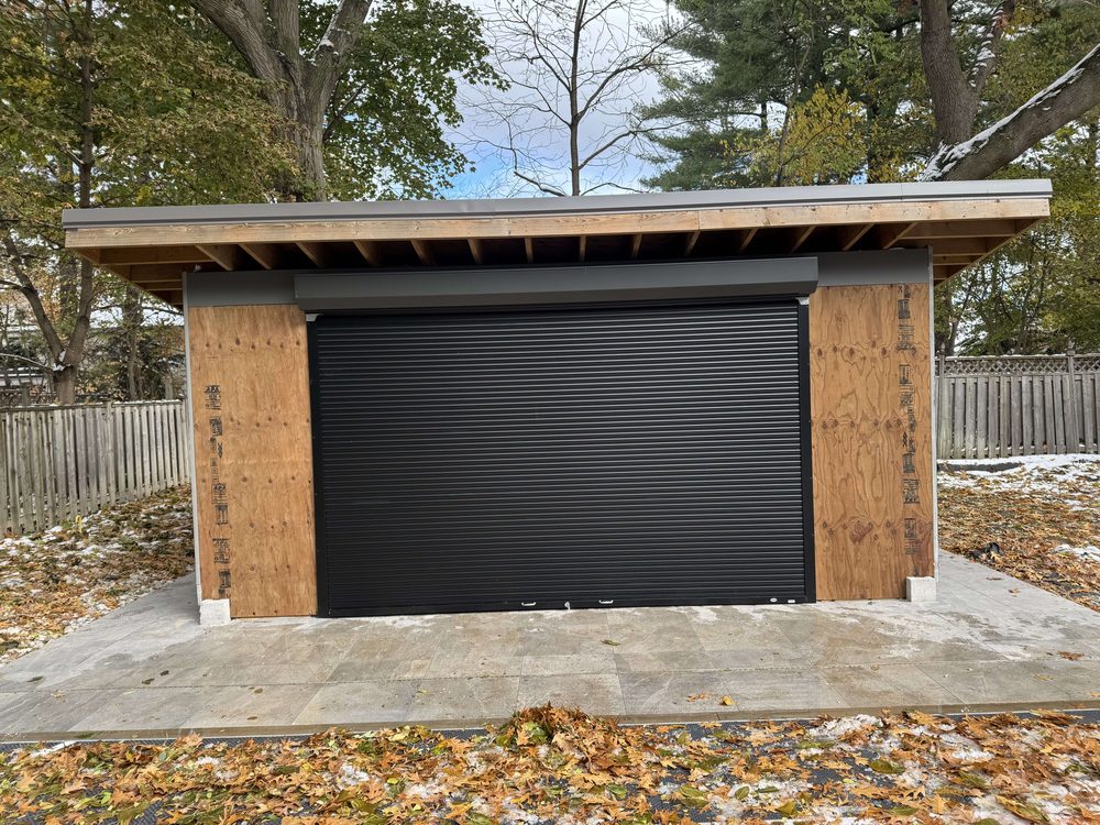 Security Shutters & Grilles installed by Canuck Door Systems for Granite Shore Homes Inc in Toronto