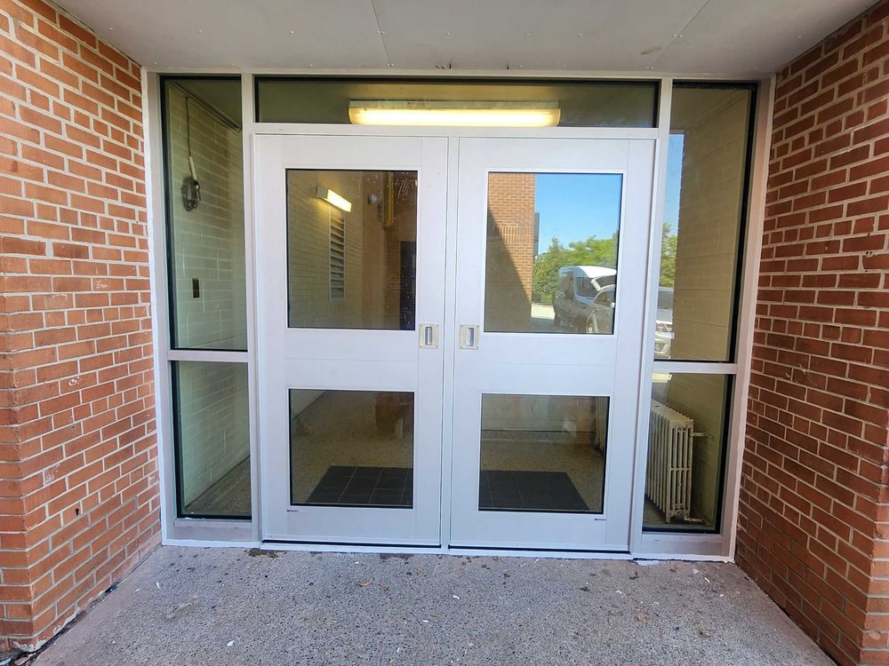 Commercial Glass & Aluminum Doors installed by Canuck Door Systems for Toronto Catholic District School Board in Toronto