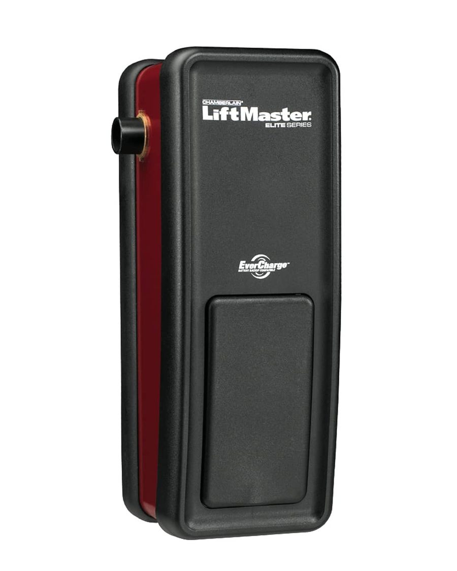 A LiftMaster 8500 Elite Series jackshaft opener, the black wall-mount unit that drives the torsion shaft from the side of the opening
