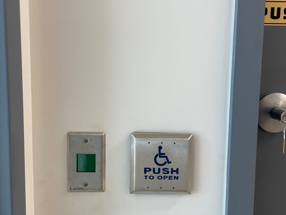 Universal washroom door package installed by Canuck Door Systems