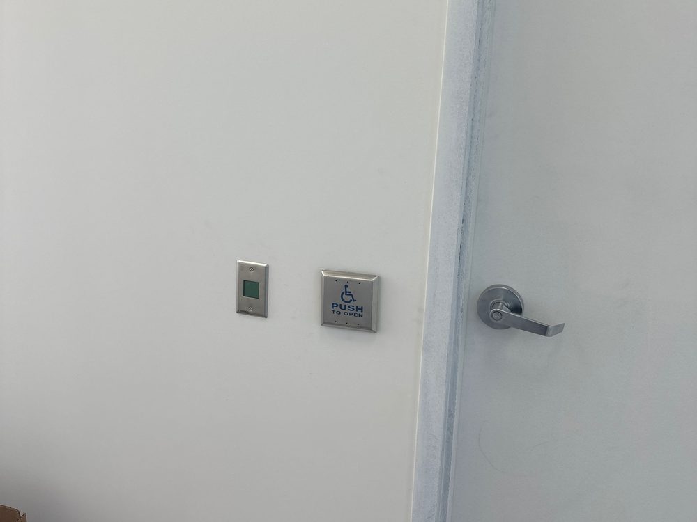 Universal washroom door package installed by Canuck Door Systems