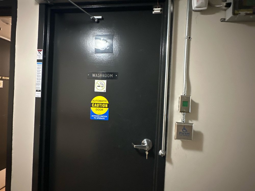 Universal washroom door package installed by Canuck Door Systems