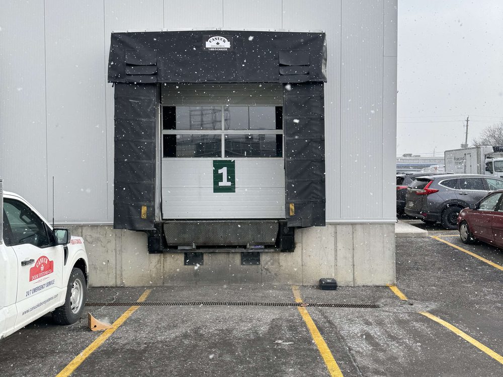 Loading dock shelter and leveler installed by Canuck Door Systems
