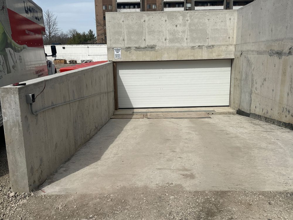 Commercial sectional overhead door installed by Canuck Door Systems
