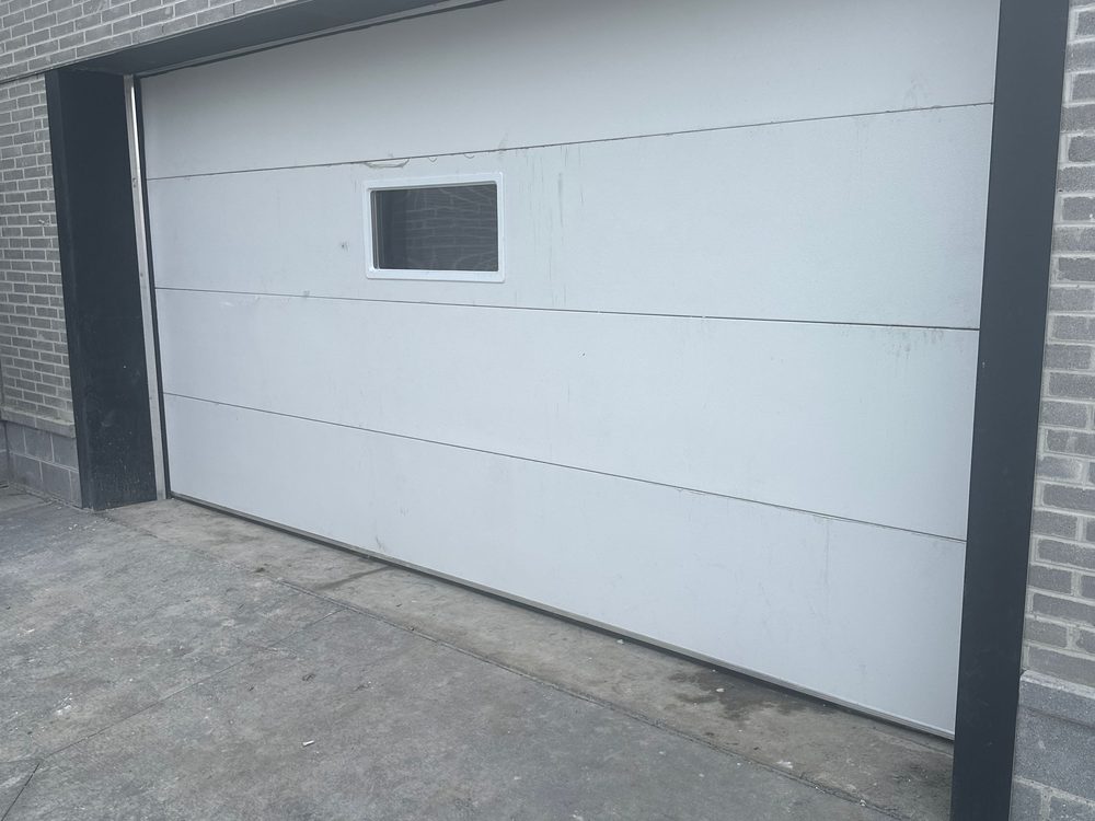 Commercial sectional overhead door installed by Canuck Door Systems