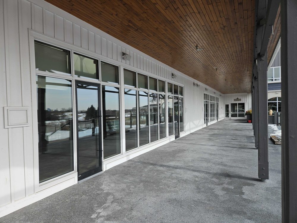 Aluminum storefront elevation installed by Canuck Door Systems