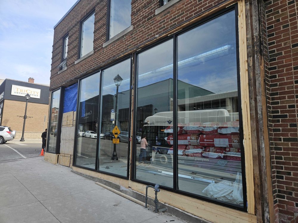 Aluminum storefront elevation installed by Canuck Door Systems for Decor Shade Systems Inc in Cambridge