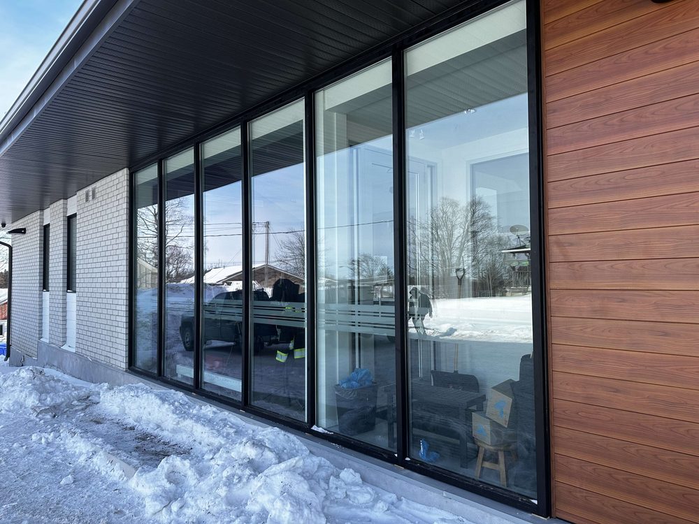 Aluminum storefront elevation installed by Canuck Door Systems