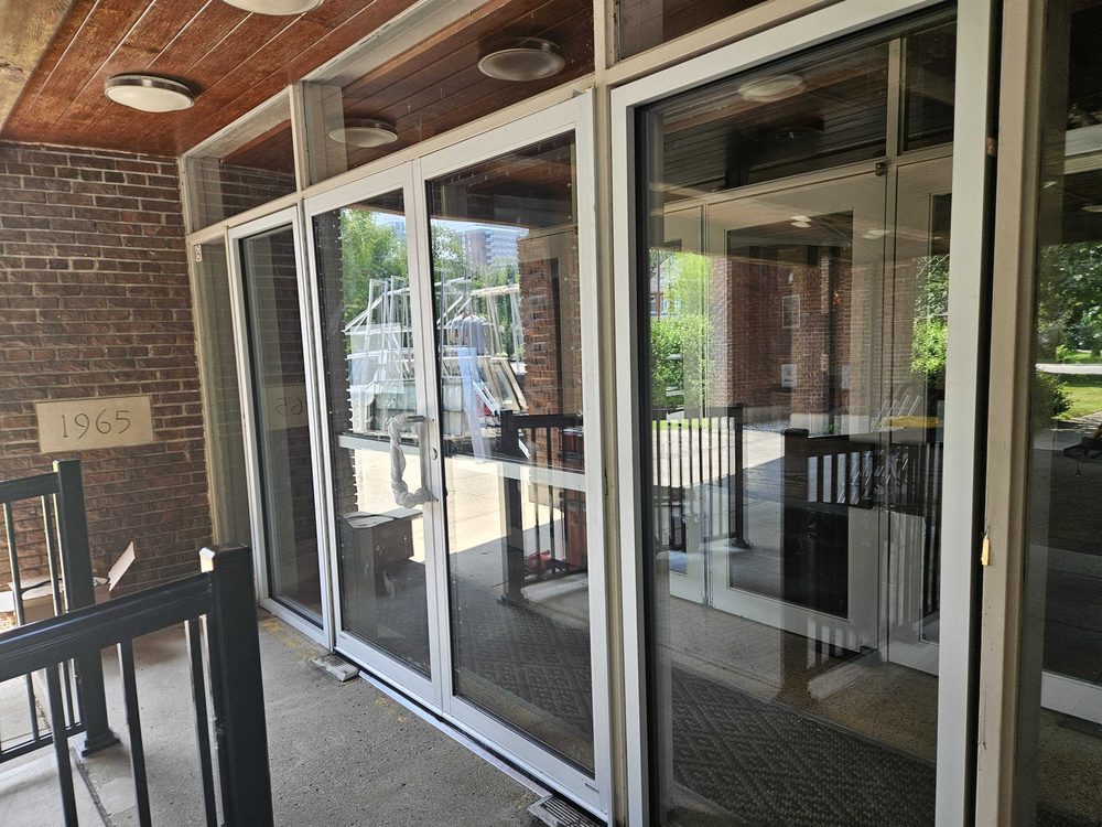 Aluminum storefront entrance doors installed by Canuck Door Systems